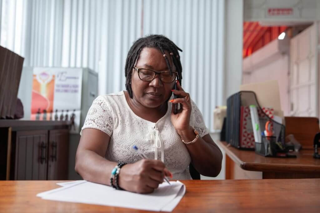 Humanitarian worker Ismène helps run a hotline for survivors of violence in Haiti.