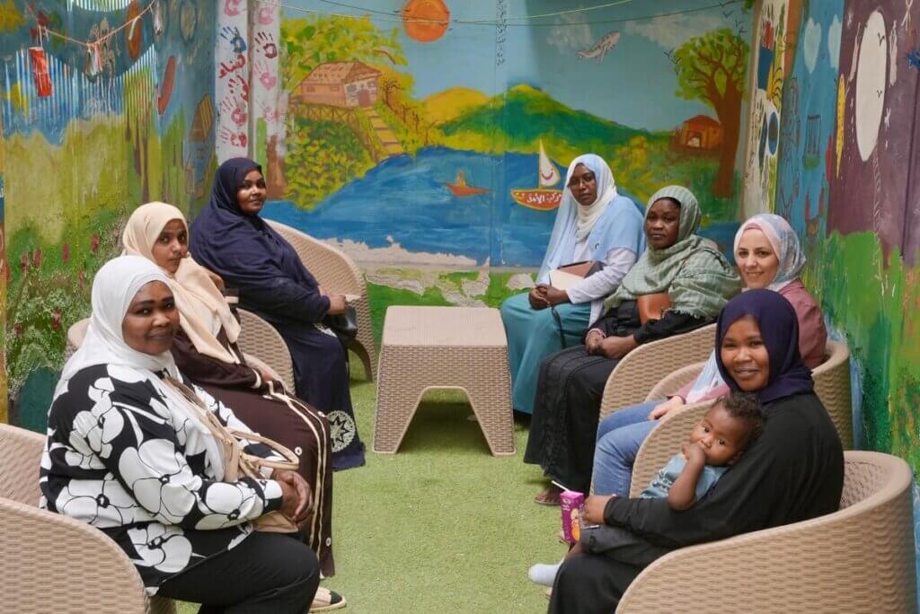 At a safe space in Giza, Egypt, women take part in a support session, designed to provide psychosocial support. 